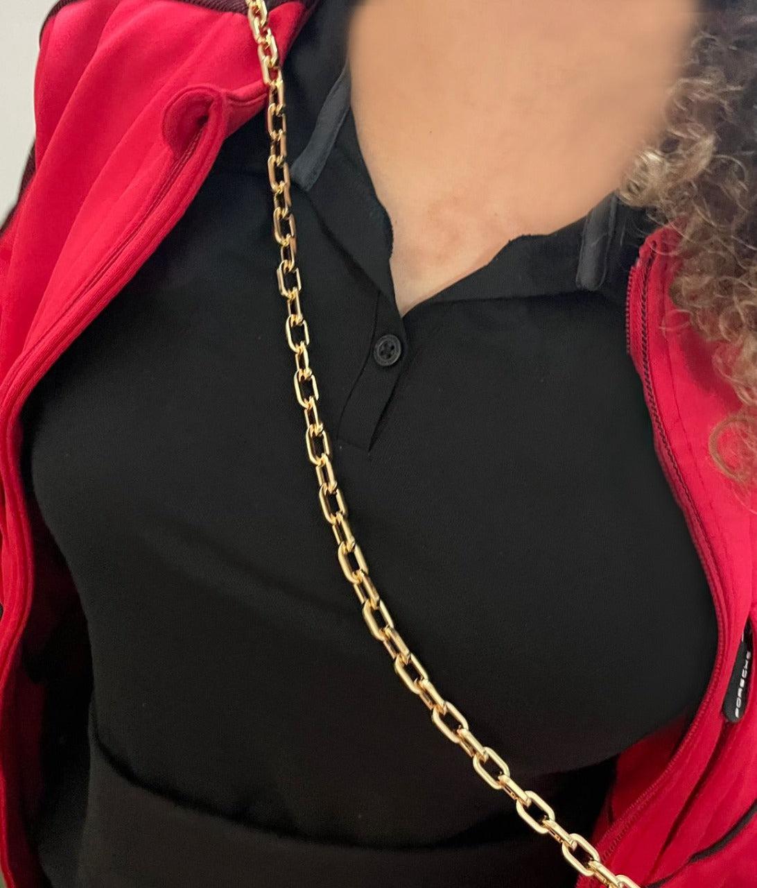gold-purse-chain-strap-being-worn-on-model